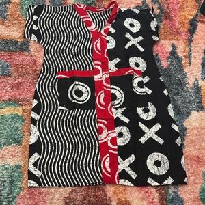 Chic Black and White Patterned Mini Dress with Red Accents